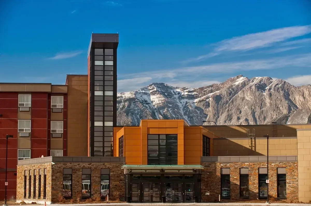 Mountain resort exterior framed by open sky